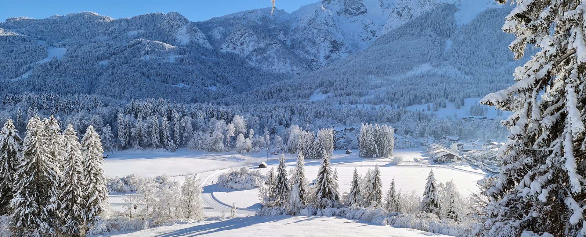 Ein grandioser Blick vom Höhenrain auf die Grainauer Loipe, © Gemeinde Grainau / E. Reindl